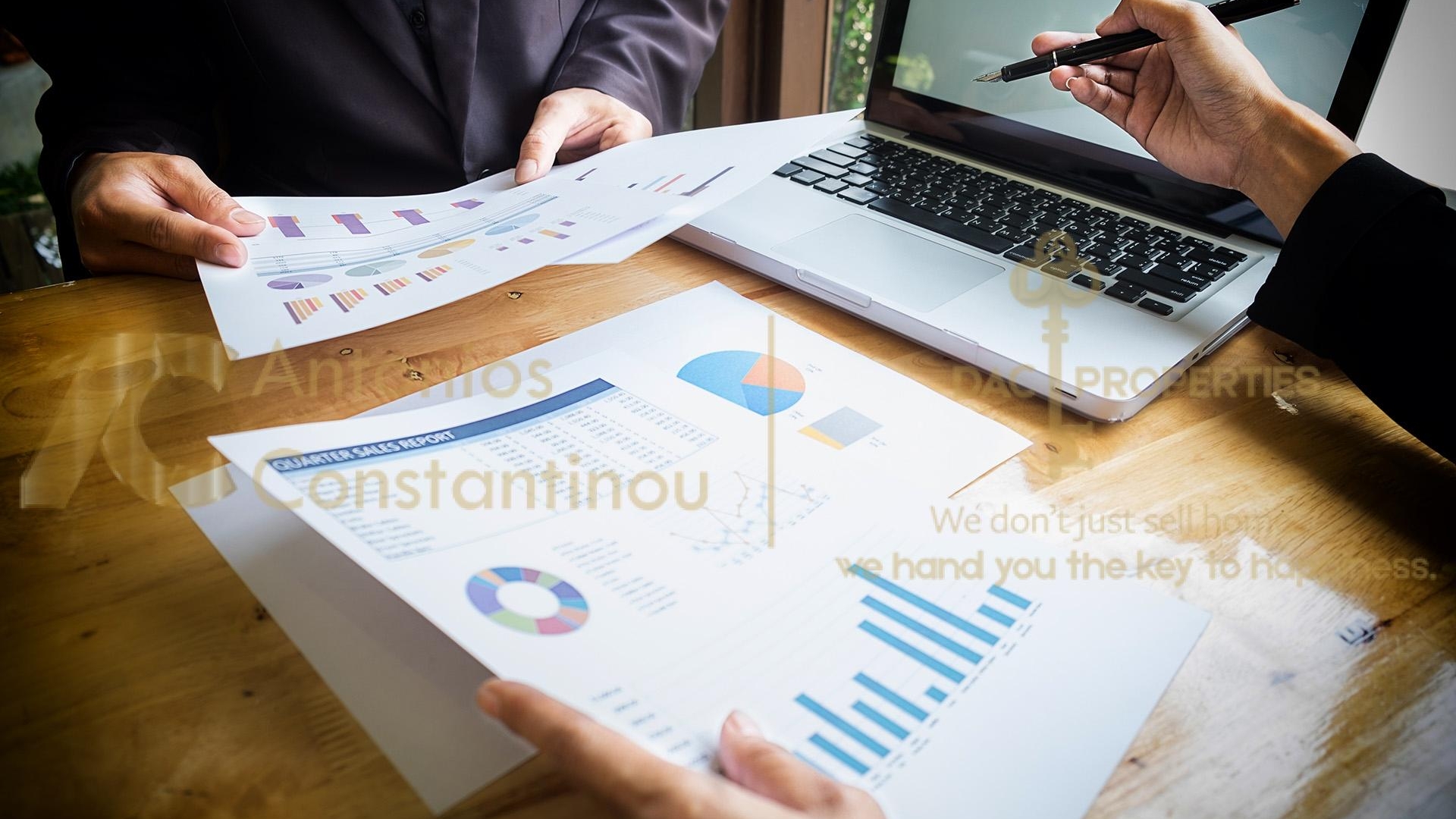 Business team working on a new business plan with modern digital computer